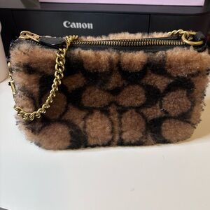 Jennifer Lopez x Coach Nolita 19